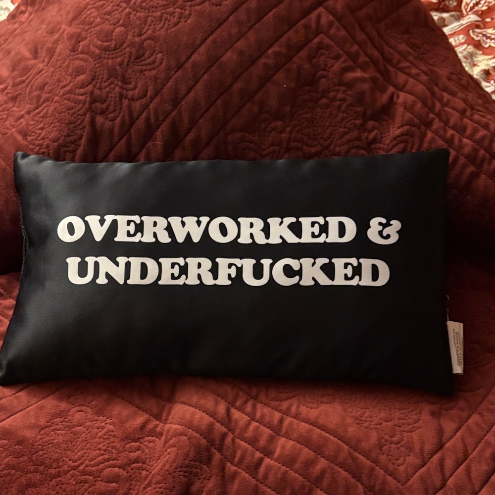 Black Decorative Pillow with White Text